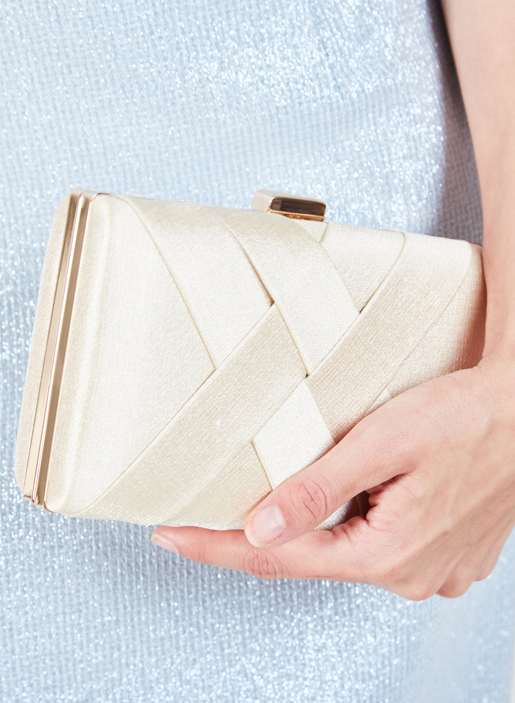 Clutch cruzado champaña